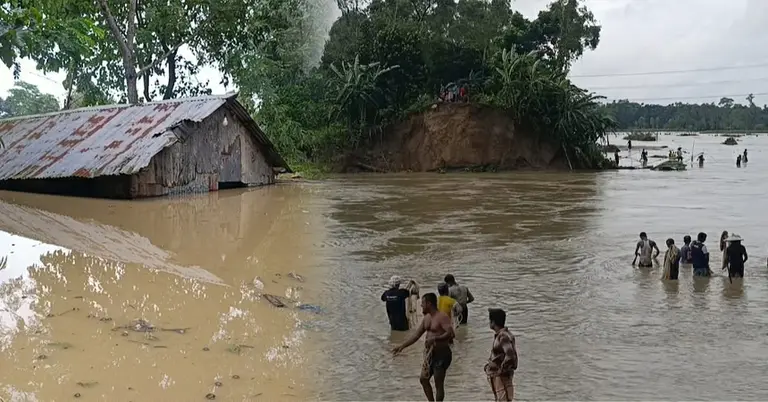 পানিতে ঘর তলিয়ে গেছে, ভেঙে যাওয়া বাঁধ